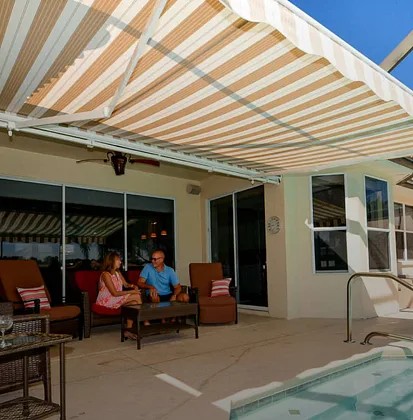 motorized retractable awning over a patio
