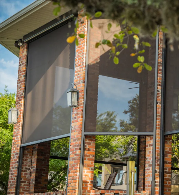screened outdoor living room with motorized exterior screens