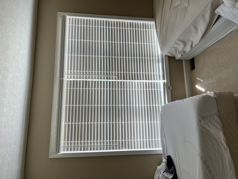 custom faux wood blinds in bedroom