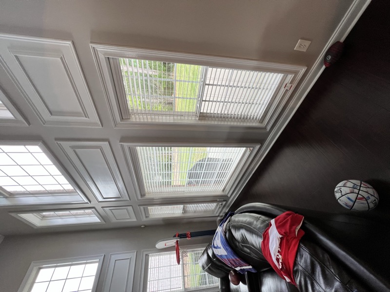 two-story living room blinds installation